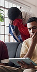 Men, watching and disappointed with tablet for sport match, loss or live game in home. Upset, male people or group of friends with bad news or France flag for defeat, online entertainment or app