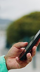 Phone, hands and woman outdoor with texting, networking or chatting on mobile app for communication. Technology, connection and female person with cellphone for contact, email or social media.