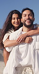 Face, couple and hug outdoor on holiday with care, smile and support on getaway with partner. Piggyback, man and woman at beach with portrait, happiness and embrace for love on summer vacation