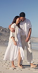 Couple, hug and walking on beach with summer holiday, conversation or connection for bonding together. Happy, married people and embrace by ocean with love, tropical vacation or discussion for travel