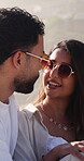 Outdoor, sunglasses or couple with conversation for holiday, tropical destination or anniversary getaway. Romantic trip, speaking or happy people with travel vacation for bonding, support or shades