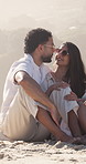 Beach, hug or couple with conversation for holiday, tropical destination or romantic anniversary getaway. Outdoor, talk or happy people with travel vacation for bonding, affection or support for love