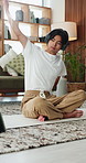 Fitness, stretching and tablet with yoga man in home living room for balance or flexibility. App, headphones and streaming with Asian person on floor in apartment for exercise or wellness activity