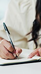 Woman, hands and writing in office with journal, reminder or idea planning for journalist story. Writer, person and notes in workplace with notebook, creativity or draft article for media publication