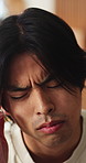 Asian man, stress and headache with massage in home for mental health, pressure or strain. Frustrated, male person or anxiety with migraine, ache or pain for vertigo, dizziness or fatigue in house