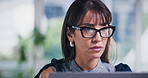 Serious, reading and businesswoman with laptop in office, creative and checking grammar with glasses. Magazine editor, eyewear and mature person with tech for media publication, online and review