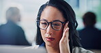 Woman, glasses and headache in office with computer, news error or journalist mistake for publication. Coworking, person and migraine in workplace with pc, stress or fatigue for online article review