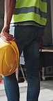Hands, helmet and toolbox on walk at construction site, technician or property development. Person, engineer and employee with safety gear, equipment or legs at workplace for building real estate