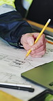 Hands, engineer and writing with team for floor plan, review or real estate development. Person, architecture and point for drawing, blueprint or feedback for property expansion at construction site