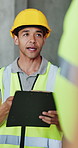 Architecture, contractor and man with clipboard, construction site for building project and talking. Feedback, person and employee with documents for renovation schedule and checklist for inspection