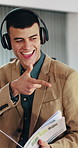 Headphones, walking and man with greeting in office, hello gesture and music playlist for motivation. Dance, employee engagement or happy staff with support for productivity, fist bump or audio tech