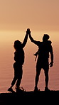Hiking, high five and back of couple on mountain with prosthetic leg for adventure, exercise and workout. Sunrise, celebrate and person with disability for wellness, health or fitness for hiker goals