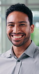 Happy, professional and face of businessman in office with confidence for finance company about us. Smile, laugh and portrait of male employee with pride for financial career at workplace in Colombia
