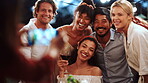 Hug, photograph and restaurant with people at dinner party together for bonding or celebration. Memories, picture and smile with group of happy friends embracing at night for meal, reunion or wine