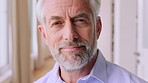 Wellness, face and old man in home with pride, positive attitude or calm on weekend break. Confidence, portrait or senior person in house with satisfaction, relaxed mood or free time in retirement.
