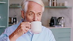 Old man, coffee and thinking in home with reflection, drink and nostalgia on break in retirement. Senior person, perspective and inspiration with warm beverage, cup and morning in kitchen at house