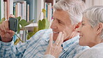 Wave, phone and old couple with video call in home, virtual greeting and contact for online communication. Hello, connection and senior people with smile for conversation, mobile app or talk together