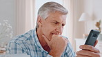 Senior, man and thinking with phone in home for online research, decision or tough choice. Elderly, male person or scrolling with mobile smartphone for web browsing, selection or pick on app in house