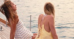 Relax, wind and girl friends on boat in summer for holiday, weekend trip or getaway together. Adventure, ocean and women with breeze in hair on yacht in sea for bonding or connection on vacation.
