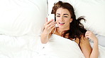 Above, video call or woman in bed with phone, comfortable or communication on dating site. Happy, conversation or female person in house with tech, online chat or connection on matchmaking platform.