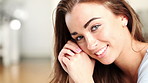 Wellness, face and woman in house with smile, positive attitude and chill on weekend break. Peaceful, space or female person in home with satisfaction, confidence and good mood in free time.