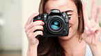 Happy woman, face and photographer with camera, countdown or thumbs up for capture in home studio. Portrait, female person or photoshoot with lens, smile or like emoji for good photography in house