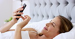 Phone, scroll and woman in bedroom, relax or check notification for online dating message. Home, smile or person in bed with mobile for social media app, love interest or search profile for matches