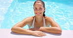 Travel, face and happy woman in pool on vacation for summer break, getaway and hospitality. Laughing, person and swimming underwater at accommodation for holiday trip, resort fun or weekend adventure