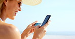 Beach, woman and online shopping with phone, credit card and laughing with discount offer on website. Outdoor, traveler and person with mobile for purchase, holiday and digital payment with debit