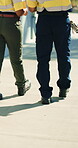 Legs, people and walking outdoor in logistics for industrial inspection, delivery planning or update. Supply chain, back and feet of team in shipping yard for export oversight, compliance or dispatch