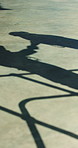 Handshake, logistics and shadow with people at depot together for delivery discussion or planning. Distribution, management and shipping with employees shaking hands outdoor for supply chain meeting