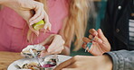 Hands, women and friends at seafood restaurant with lemon garnish, oyster meal and enhances flavor. People, citrus and juice with shellfish for food safety, palate cleanser and gourmet appetizer