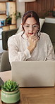 Thinking, woman and remote work on laptop in home for story inspiration, article idea or planning. Editing, thoughtful or freelance journalist with tech at desk for headline solution, insight or news
