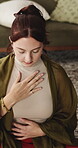 Meditation, calm or woman in home for wellness, relaxation routine or body awareness practice for zen. Mindfulness, inner peace or person in lounge with spiritual exercise, chakra balance or healing