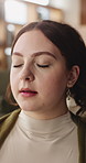 Calm, woman and relax with breathing exercise in home for comfort, stress relief or meditation. Female person, eyes closed or zen with inner peace for mindfulness, awareness or mental health in house