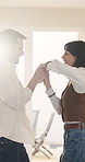 Dance, hug and spin with couple laughing in home together for bonding, relationship or romance. Fun, holding hands and rhythm with happy people embracing in apartment for connection, safety or trust