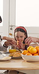 Love, parents and daughter in home with breakfast, bonding or childcare in healthy relationship. Happy, people or child with meal, morning routine or family connection for childhood development.