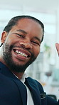 Black man, selfie and face at office with peace sign, smile and post on web at property development company. African person, happy and photography with emoji, v symbol and portrait at agency in Kenya