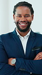 Black man, face and arms crossed at office with smile, pride and confident at property development company. African person, realtor and happy in portrait, career and real estate agency in Kenya