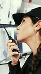 Security, woman and discussion with radio in control room, working late or surveillance with camera. Watch, video and mature person with tech for protection service, guard and communication at night