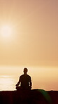Outdoor, mindfulness and man at beach for meditation, calm and routine for peace on summer vacation. Silhouette, mockup space and person in nature, mental health and sunrise on holiday and ocean