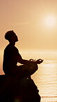 Calm, mindfulness and man at beach for meditation, outdoor and routine for peace on summer vacation. Silhouette, mockup space and person in nature, mental health and sunrise on holiday and ocean