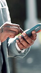 Scroll, hands and phone with business man in city for communication, real estate listing and connection. Text message, client feedback and property viewing schedule with person and mobile outdoor