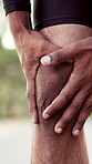 Fitness, man and hands with massage for knee pain, sports injury and medical problem from exercise. Outdoor, runner and person with joint inflammation, muscle strain or accident from intense workout.