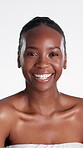 Skincare, face and happy woman with glow in studio, laugh and cosmetics for healthy skin and beauty. White background, portrait and black person with smile, wellness and self care with dermatology