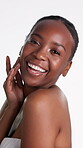 Laughing, woman and skincare for face in studio, wellness and dermatology for healthy skin benefits. White background, portrait and black person with smile for shine, cosmetics and beauty in Kenya