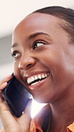 Black woman, phone call and smile in office with chat for creative agency, management and startup. Conversation, magazine editor and talk with tech for project, development  or journalist with laugh