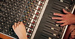 People, hands or audio engineer with sound board for radio production, live streaming or management. Top view, podcaster or team working with control panel for tune, volume or adjusting effects