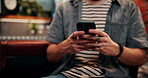 Producer, man and hands in music studio with phone, scroll website and trends for song inspiration. Artist, person and typing with tech for online research, creativity or download app for album idea.