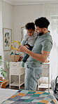 Baby, family and music with father in bedroom of home for development, love or security. Bonding, safety and toy of infant child with single parent man in apartment for future, growth or playing